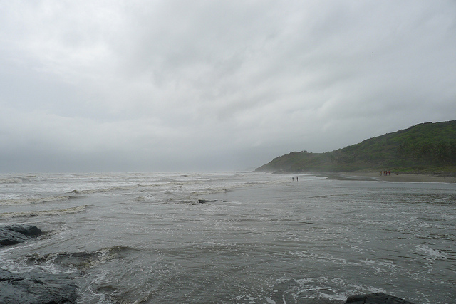 cloudy grey, foggy sky by the water